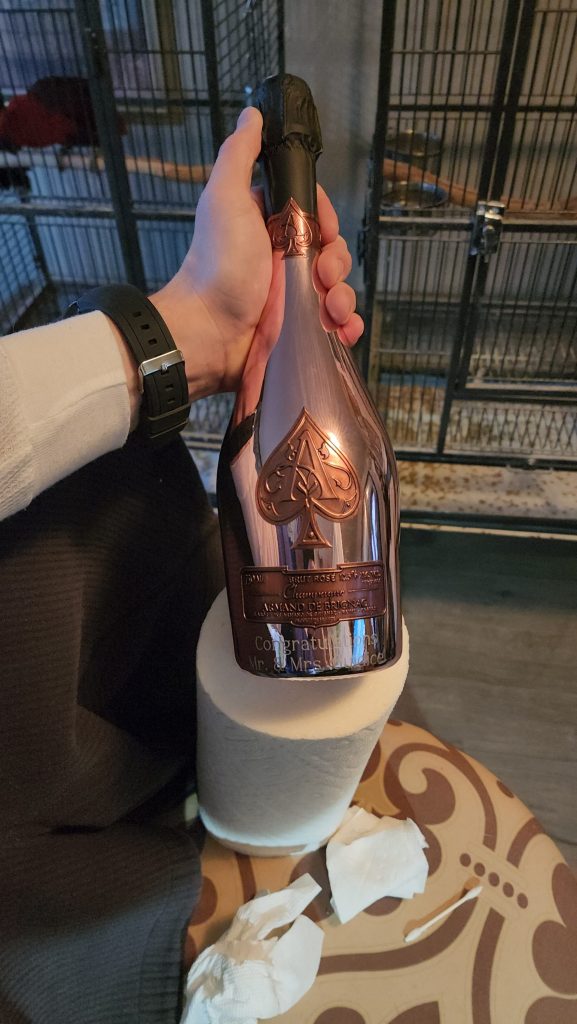 Champagne bottle with inscription